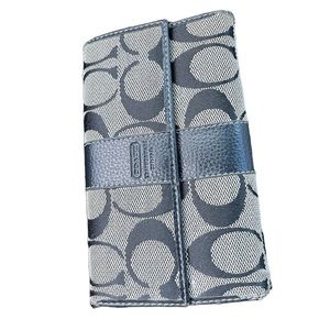 Black and beige coach, wallet, slots for car and cash in coins